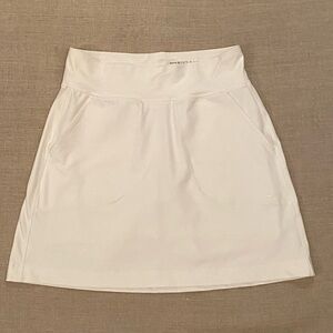 Nike Women’s Golf Skort. Tour Performance Dri-Fit. Color white. Size XS